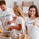 Volunteers preparing food and supplies for charity