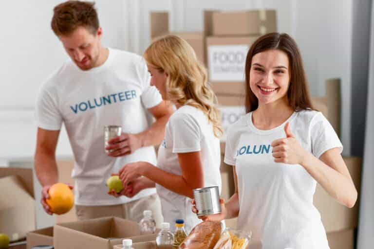 Volunteers preparing food and supplies for charity